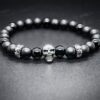 Pulsera de piedras calavera night